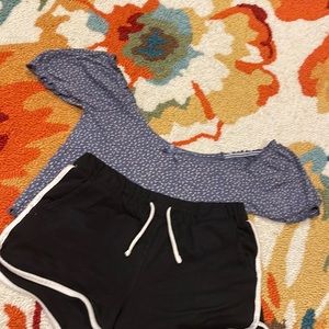 Cute blue blouse with white floral disign